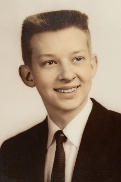 Formal portrait as a high school senior, age 16.
